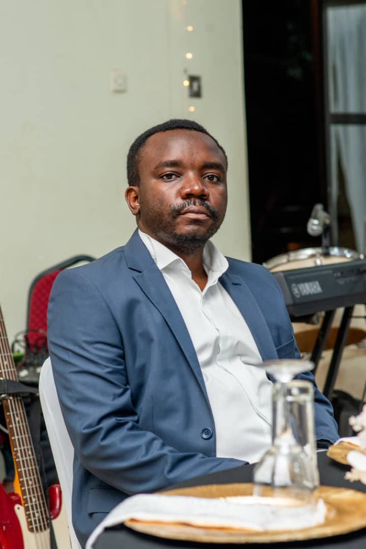 Portrait of Derrick MUKURASI